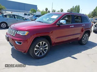 2017 Jeep Grand Cherokee Overland with VIN 1C4RJFCTXHC676236, listed as a IAAI auction lot 42164645 with 94,658 mi miles and . Bid and sale history available at DreamBid. Image 2.