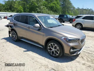 2020 BMW X1 xDrive28i z VIN WBXJG9C09L5R23653, wystawiony jako Copart lot #52771535 z przebiegiem 54 550 mil mil oraz Szkody całkowita. Historia ofert i sprzedaży dostępna na DreamBid. Obrazek 4.