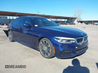 2019 BMW 5 Series 540i z VIN WBAJE5C56KG919325, wystawiony jako IAAI lot #41712632 z przebiegiem 71 413 mil mil oraz . Historia ofert i sprzedaży dostępna na DreamBid. Obrazek 1.