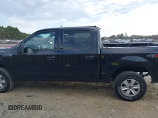 2019 Ford F-150 XL with VIN 1FTEW1E53KFA20399, listed as a IAAI auction lot 41846887 with 94,896 mi miles. Bid and sale history available at carsss.com. Image 14.