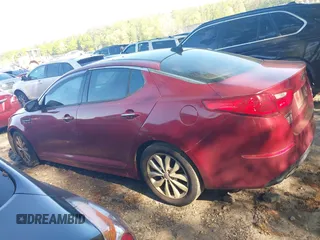 2015 Kia Optima EX with VIN 5XXGN4A70FG385182, listed as a IAAI auction lot 42005000 with 199,417 mi miles. Bid and sale history available at carsss.com. Image 14.