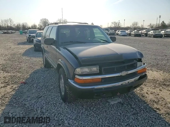 2000 Chevrolet Blazer LT z VIN 1GNDT13W9Y2135306, wystawiony jako Copart lot #47902155 z przebiegiem 152 008 mil mil oraz Szkoda całkowita • Salvage title. Historia ofert i sprzedaży dostępna na DreamBid. Obrazek 12.