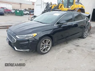 2019 Ford Fusion SEL with VIN 3FA6P0CD9KR237633, listed as a IAAI auction lot 41850201 with 68,157 mi miles. Bid and sale history available at carsss.com. Image 2.