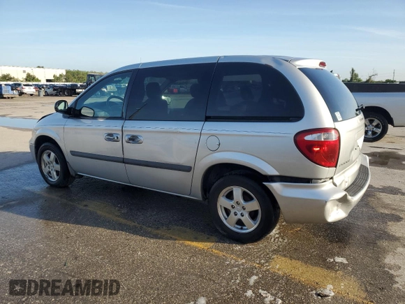 2005 Dodge Caravan SXT with VIN 1D4GP45R95B419486, listed as a Copart auction lot 60313045 with 180,615 mi miles and Salvage title. Bid and sale history available at DreamBid. Image 2.