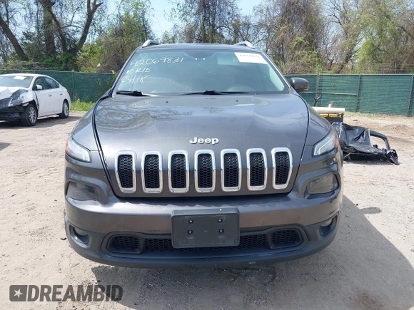 2017 Jeep Cherokee Latitude with VIN 1C4PJMCB0HW583128, listed as a IAAI auction lot 42069831 with 63,497 mi miles and . Bid and sale history available at DreamBid. Image 13.