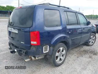 2015 Honda Pilot EX-L with VIN 5FNYF4H56FB040909, listed as a IAAI auction lot 42028609 with 267,375 mi miles and . Bid and sale history available at carsss.com. Image 4.