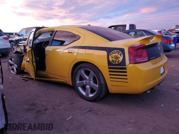 2007 Dodge Charger SRT-8 with VIN 2B3KA73W97H662391, listed as a Copart auction lot 82000474 with 141,721 mi miles and Salvage Title. Bid and sale history available at DreamBid. Image 2.