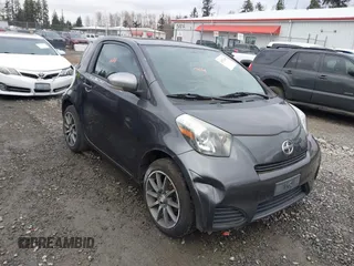 2012 Scion iQ z VIN JTNJJXB05CJ012257, wystawiony jako IAAI lot #41532464 z przebiegiem 127 134 mil mil oraz . Historia ofert i sprzedaży dostępna na DreamBid. Obrazek 1.