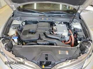 2015 Lincoln MKZ Hybrid z VIN 3LN6L2LU1FR606066, wystawiony jako Copart lot #61955415 z przebiegiem 127 214 mil mil oraz Szkoda całkowita • Salvage title. Historia ofert i sprzedaży dostępna na DreamBid. Obrazek 11.