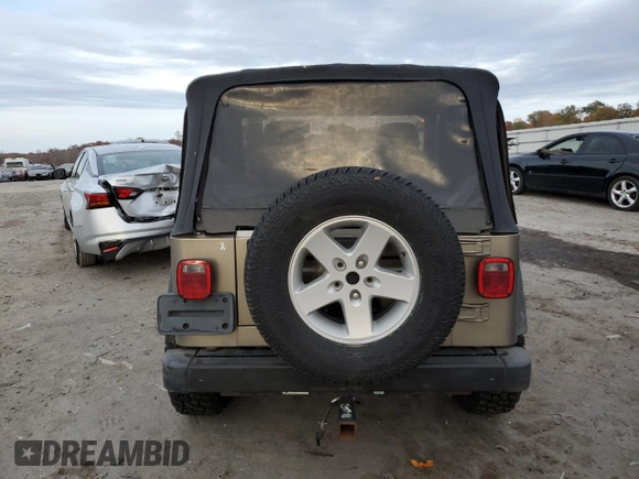 2003 Jeep Wrangler SE with VIN 1J4FA29183P324978, listed as a Copart auction lot 79172464 with Not provided miles and Salvage title. Bid and sale history available at DreamBid. Image 6.