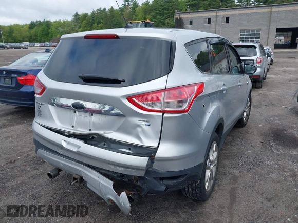 2013 Ford Escape SEL с VIN 1FMCU9H97DUC06371, выставлен на аукционе IAAI как лот 42255108 с пробегом 158 024 миль миль и . История ставок и продаж доступна на DreamBid. Изображение 4.