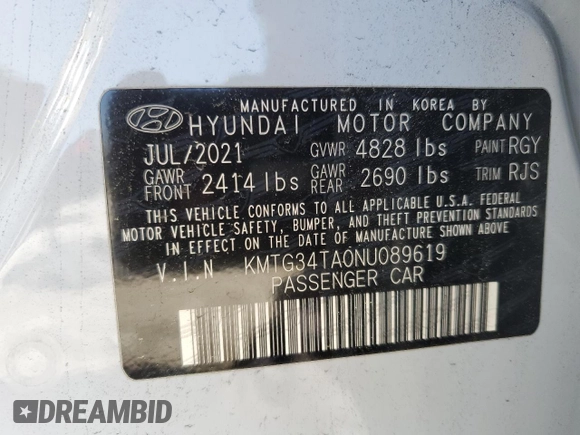 2022 Genesis G70 2.0T z VIN KMTG34TA0NU089619, wystawiony jako Copart lot #52154495 z przebiegiem 70 890 mil mil oraz Szkody całkowita. Historia ofert i sprzedaży dostępna na DreamBid. Obrazek 15.
