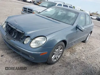 2005 Mercedes-Benz E-Class 3.2L CDI with VIN WDBUF26J75A556690, listed as a IAAI auction lot 40146146 with 1 mi miles. Bid and sale history available at carsss.com. Image 2.