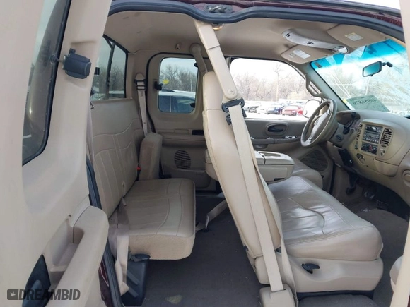2000 Ford F-150 XL with VIN 1FTRX18L2YNA50128, listed as a IAAI auction lot 40956879 with 1 mi miles. Bid and sale history available at carsss.com. Image 8.