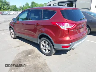 2015 Ford Escape SE with VIN 1FMCU0G72FUC31709, listed as a IAAI auction lot 42135657 with 157,952 mi miles. Bid and sale history available at carsss.com. Image 3.