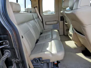 2005 Ford F-150 XLT with VIN 1FTPX12575NB60735, listed as a Copart auction lot 49598075 with 153,360 mi miles and Salvage title. Bid and sale history available at DreamBid. Image 10.