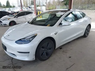 2020 Tesla Model 3 Standard Range Plus with VIN 5YJ3E1EA3LF740380, listed as a IAAI auction lot 41944372 with 44,148 mi miles. Bid and sale history available at carsss.com. Image 17.
