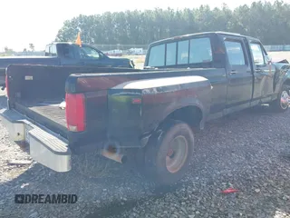 1996 Ford F-350 with VIN 1FTJW35F1TEA15051, listed as a IAAI auction lot 40357502 with Not provided miles and . Bid and sale history available at DreamBid. Image 4.