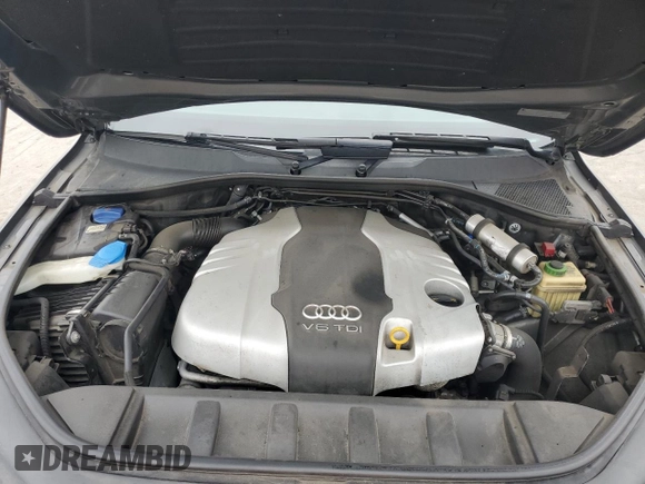 2014 Audi Q7 Prestige с VIN WA1WMAFE5ED015613, выставлен на аукционе Copart как лот 73987704 с пробегом 130 939 миль миль и Списание • Salvage title. История ставок и продаж доступна на DreamBid. Изображение 12.