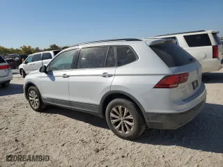 2018 Volkswagen Tiguan S with VIN 3VV1B7AX7JM013797, listed as a Copart auction lot 77445924 with 194,708 mi miles and Salvage Title. Bid and sale history available at carsss.com. Image 2.