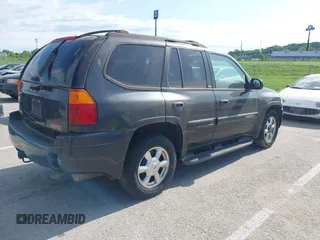 2003 GMC Envoy SLE z VIN 1GKDT13S832272692, wystawiony jako IAAI lot #42289095 z przebiegiem 215 210 mil mil oraz . Historia ofert i sprzedaży dostępna na DreamBid. Obrazek 4.