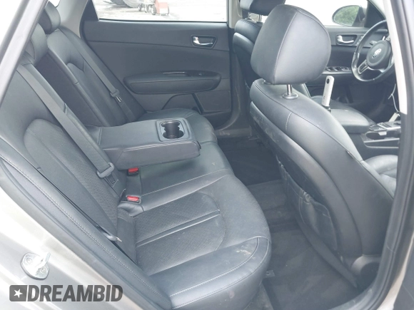 2018 Kia Optima EX with VIN 5XXGU4L36JG253629, listed as a IAAI auction lot 42079946 with 136,575 mi miles and . Bid and sale history available at carsss.com. Image 8.