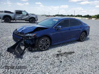 2025 Toyota Camry LE with VIN 4T1DAACK0SU075581, listed as a Copart auction lot 54570525 with 2,329 mi miles and Non Repairable. Bid and sale history available at DreamBid. Image 1.