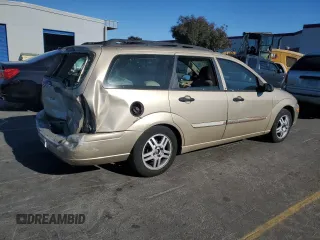 2001 Ford Focus SE with VIN 1FAFP36371W363523, listed as a Copart auction lot 77208164 with Not Provided miles and Salvage Title. Bid and sale history available at carsss.com. Image 3.