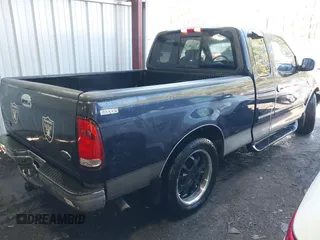 2001 Ford F-150 XL with VIN 1FTRX17W61NC04079, listed as a IAAI auction lot 41821705 with 174,011 mi miles and . Bid and sale history available at DreamBid. Image 4.