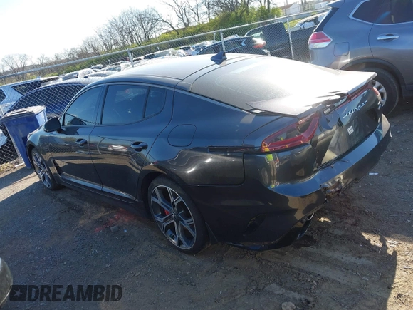2021 Kia Stinger GT with VIN KNAE35LC4M6097199, listed as a IAAI auction lot 41884424 with 61,490 mi miles. Bid and sale history available at carsss.com. Image 13.