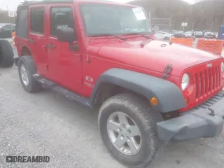 2008 Jeep Wrangler Unlimited X with VIN 1J8GA39128L562347, listed as a IAAI auction lot 41912669 with 106,040 mi miles. Bid and sale history available at carsss.com. Image 1.