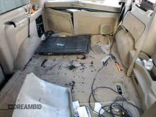 2003 GMC Safari with VIN 1GKEL19X83B512525, listed as a Copart auction lot 79059984 with 122,800 mi miles and Salvage Title. Bid and sale history available at carsss.com. Image 10.
