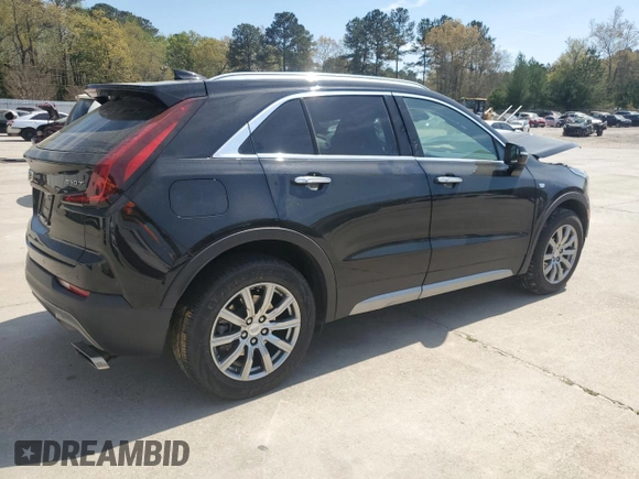 2021 Cadillac XT4 FWD Premium Luxury z VIN 1GYFZCR48MF002468, wystawiony jako Copart lot #50878955 z przebiegiem 76 034 mil mil oraz Szkoda całkowita • Salvage title. Historia ofert i sprzedaży dostępna na DreamBid. Obrazek 3.