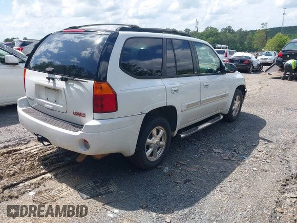 2003 GMC Envoy SLT with VIN 1GKDS13S632266506, listed as a IAAI auction lot 42149049 with 259,884 mi miles and . Bid and sale history available at DreamBid. Image 4.
