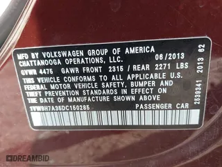 2013 Volkswagen Passat SE w/Sunroof with VIN 1VWBH7A35DC150285, listed as a IAAI auction lot 38970420 with 160,374 mi miles. Bid and sale history available at carsss.com. Image 9.