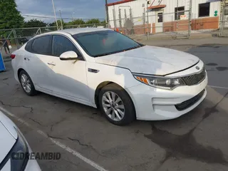 2016 Kia Optima EX with VIN 5XXGU4L38GG008436, listed as a IAAI auction lot 42094498 with 134,781 mi miles. Bid and sale history available at carsss.com. Image 1.