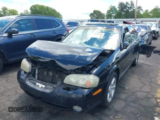 2002 Nissan Maxima GXE z VIN JN1DA31DX2T411198, wystawiony jako IAAI lot #42188090 z przebiegiem Nie podano mil oraz . Historia ofert i sprzedaży dostępna na DreamBid. Obrazek 2.
