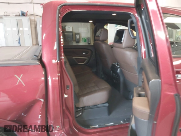 2021 Nissan Titan Pro-4X with VIN 1N6AA1ED9MN525986, listed as a IAAI auction lot 41795296 with 34,395 mi miles and . Bid and sale history available at DreamBid. Image 8.