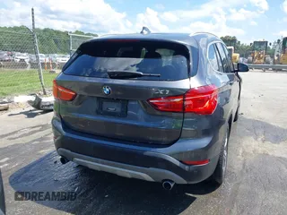 2017 BMW X1 xDrive28i with VIN WBXHT3Z38H4A55086, listed as a IAAI auction lot 42459276 with 101,907 mi miles and . Bid and sale history available at DreamBid. Image 16.