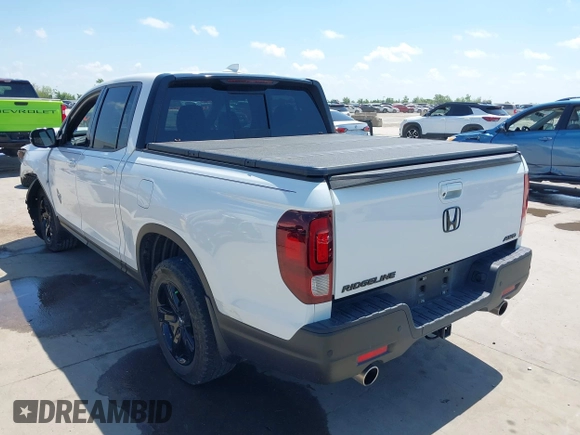 2023 Honda Ridgeline Black Edition with VIN 5FPYK3F8XPB009920, listed as a IAAI auction lot 42086798 with 37,192 mi miles and . Bid and sale history available at DreamBid. Image 3.