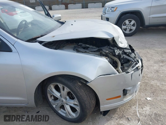 2012 Ford Fusion SE with VIN 3FAHP0HA4CR105663, listed as a IAAI auction lot 41805943 with 359,046 mi miles and . Bid and sale history available at DreamBid. Image 16.