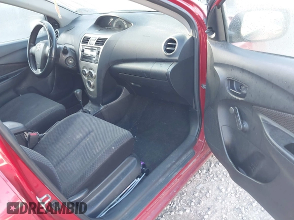 2007 Toyota Yaris with VIN JTDBT923X71065311, listed as a IAAI auction lot 42055142 with 173,949 mi miles. Bid and sale history available at carsss.com. Image 5.