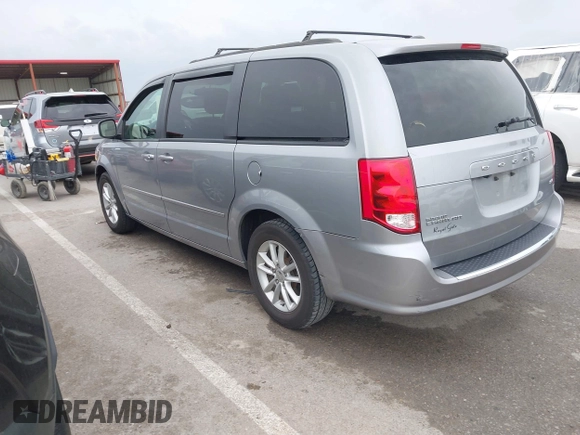 2014 Dodge Grand Caravan SXT with VIN 2C4RDGCG0ER417662, listed as a IAAI auction lot 41933279 with 156,751 mi miles and . Bid and sale history available at DreamBid. Image 3.