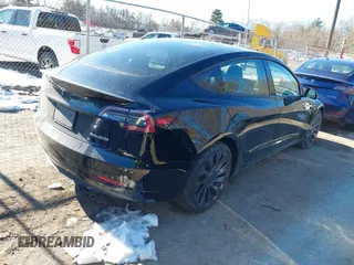 2021 Tesla Model 3 Performance with VIN 5YJ3E1EC5MF090518, listed as a IAAI auction lot 38775658 with 14,118 mi miles and . Bid and sale history available at carsss.com. Image 4.