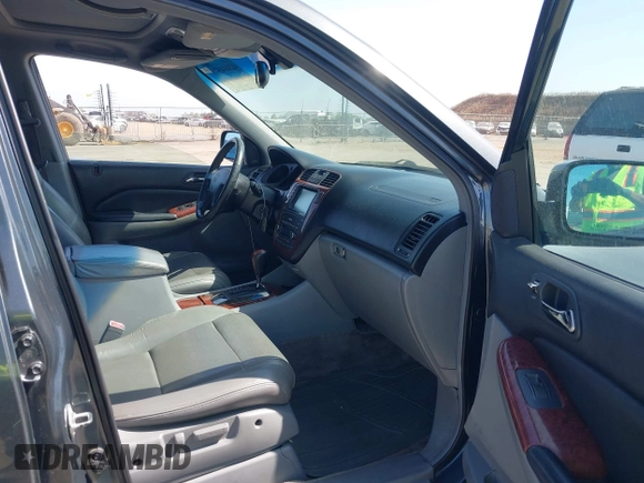 2005 Acura MDX Touring z VIN 2HNYD18885H530026, wystawiony jako IAAI lot #42414576 z przebiegiem 199 421 mil mil oraz . Historia ofert i sprzedaży dostępna na DreamBid. Obrazek 5.