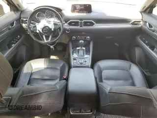 2018 Mazda CX-5 Grand Touring with VIN JM3KFBDM8J0342272, listed as a Copart auction lot 61930115 with 119,727 mi miles and Salvage title. Bid and sale history available at DreamBid. Image 8.