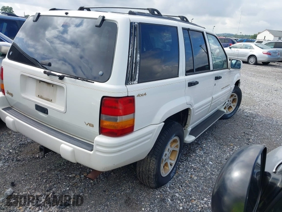 1996 Jeep Grand Cherokee Limited with VIN 1J4GZ78Y1TC381474, listed as a IAAI auction lot 42467661 with 155,587 mi miles and . Bid and sale history available at DreamBid. Image 4.