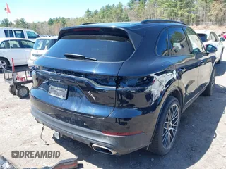 2023 Porsche Cayenne Turbo S E-Hybrid with VIN WP1AA2AY1PDA09888, listed as a IAAI auction lot 41988571 with 14,924 mi miles and . Bid and sale history available at DreamBid. Image 4.