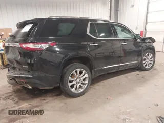 2018 Chevrolet Traverse Premier z VIN 1GNEVJKW6JJ179467, wystawiony jako IAAI lot #41214356 z przebiegiem 93 931 mil mil oraz . Historia ofert i sprzedaży dostępna na DreamBid. Obrazek 4.