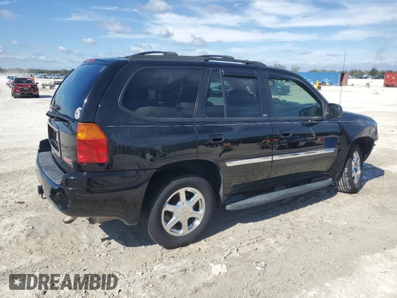2007 GMC Envoy SLE with VIN 1GKDS13S472107120, listed as a Copart auction lot 42393475 with 106,499 mi miles and Salvage Title. Bid and sale history available at carsss.com. Image 3.